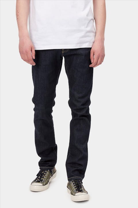 Carhartt WIP - Donkerblauwe Rebel Pant slim tapered jeans